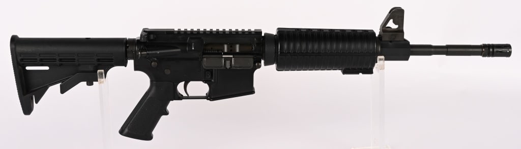 DPMS - PANTHER ARMS MODEL A-15 SBR CLASS III 5.56: SERIAL NUMBER: FH34668 BARREL: 15" CALIBER: 5.56 MM. MANUFACTURED: 2000's Metal has standard finish with clamp on front sight and no rear sight. Standard M-4 stock, forend, and pistol grip. CONDITION:
