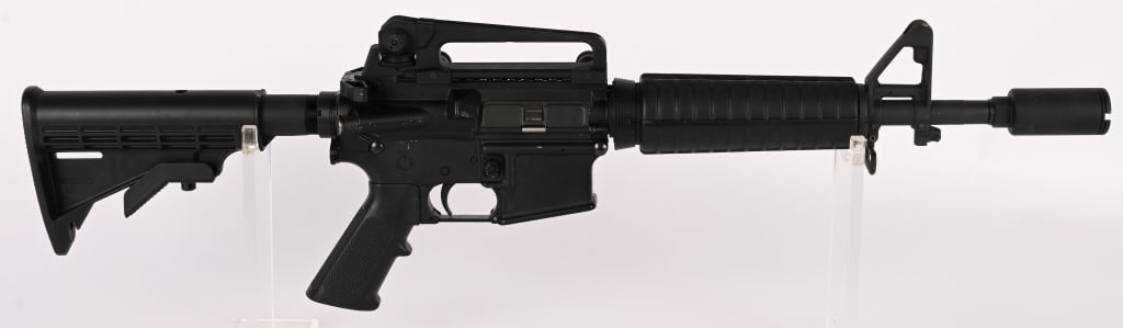 BUSHMASTER XM-15 - E2S SBR CLASS III IN 5.56 MM: SERIAL NUMBER: LBM17427 BARREL: 12" CALIBER: 5.56 MANUFACTURED: 2000s Metal has standard finish with A2 front sight and clamp on carry handle sight. Standard M-4 style Butt stock, forend and pistol gr