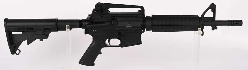 BUSHMASTER XM-15 - E2S SBR CLASS III IN 5.56 MM: SERIAL NUMBER: LBM17500 BARREL: 12" CALIBER: 5.56 MANUFACTURED: 2000's Metal has standard finish with A2 front sight and clamp on carry handle sight. Standard M-4 style Butt stock, forend and pistol g