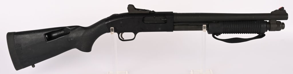 MOSSBERG 590A1 SBS CLASS III PUMP ACTION 12 GA.: SERIAL NUMBER: R970703 BARREL: 14" CALIBER: 12 GA. MANUFACTURED: 2000's Metal is standard mat finished with ghost ring type rifle sights. Black polymer forend and Speed Feed stock. CONDITION: Metal is