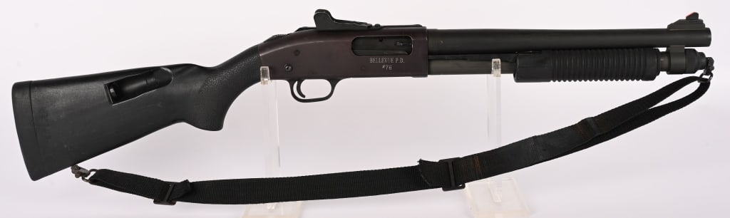 MOSSBERG 590A1 SBS CLASS III PUMP ACTION 12 GA.: SERIAL NUMBER: R309261 BARREL: 14" CALIBER: 12 GA. MANUFACTURED: 2000's Metal is standard mat finished with ghost ring type rifle sights. Black polymer forend and Speed Feed stock. 6-round side saddle