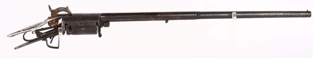 NORTH & SKINNER REVOLVING RIFLE 1856-1859: SERIAL NUMBER: N/A, BARREL: 23 1/2", CALIBER: about .60. MFG: 1856-1859. Rare North & Skinner project rifle. It is estimated that only 600 were produced from 1856-1859. Part octagon / round barrel mar