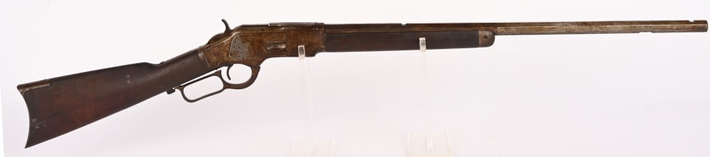 WINCHESTER MODEL 1873 PROJECT RIFLE 32 W.C.F.: SERIAL NUMBER: 484326B BARREL: 24 1/4" CALIBER: 32 W.C.F. MANUFACTURED: 1895 This is a great project rifle to be restored. Missing sights. magazine tube and small screws. Bore is frosted with strong