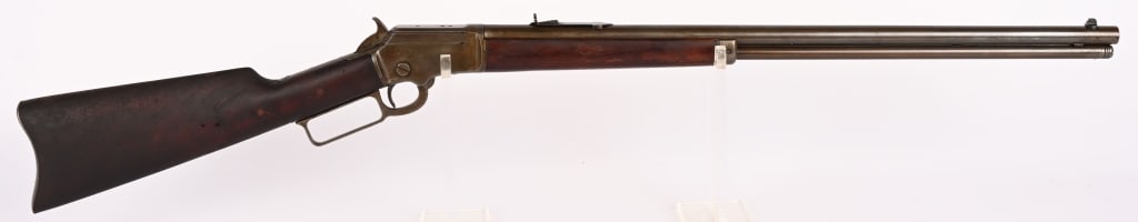 MARLIN MODEL 92 LEVER ACTION RIFLE IN 32-20: SERIAL NUMBER: 365081 BARREL: 24" CALIBER: 32 - 20 MANUFACTURED: 1906 Made in the USA. Metal was blue finish with case color receiver. Standard sights with Walnut stock and forend. CONDITION: Metal