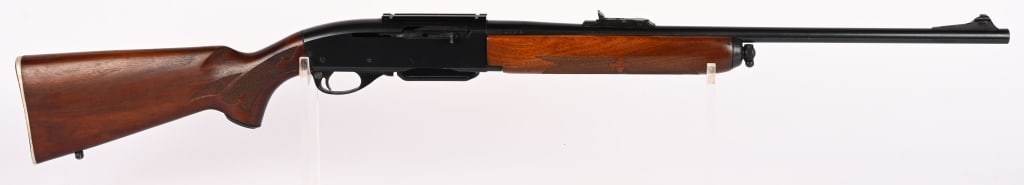REMINGTON MODEL 742 WOODSMASTER IN 30-06: SERIAL NUMBER: 242131 BARREL: 22" CALIBER: 30-06 SPRG. MANUFACTURED: 1951 - 1967 Metal is blue finish with standard sights. 3- round magazine is present. Press checkered walnut stock and forend.