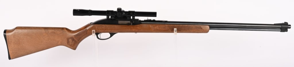 MARLIN MODEL 60 SEMI AUTO RIFLE W/ SCOPE: SERIAL NUMBER: 71427648. BARREL: 22". CALIBER: 22 LR. MANUFACTURED: 1976. Metal is blue finish with coated receiver. Wood is hardwood with pressed wild life scene and plastic butt plate. It sports a