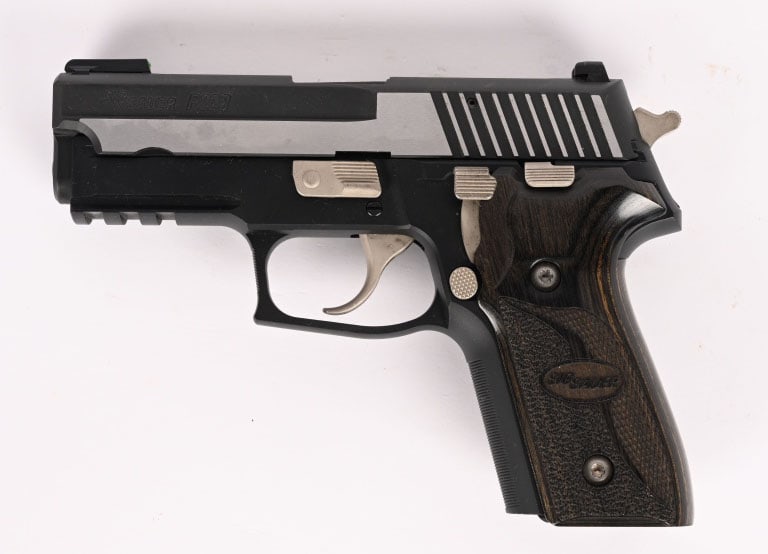 SIG SAUER MODEL P229 EQUINOX SEMI AUTO PISTOL: SERIAL NUMBER: AHU08317. BARREL: 4". CALIBER: .40 S&W. The Equinox name refers to the design of the two-tone version that Sig Sauer introduced into the P229 line-up. It has a color contrast between