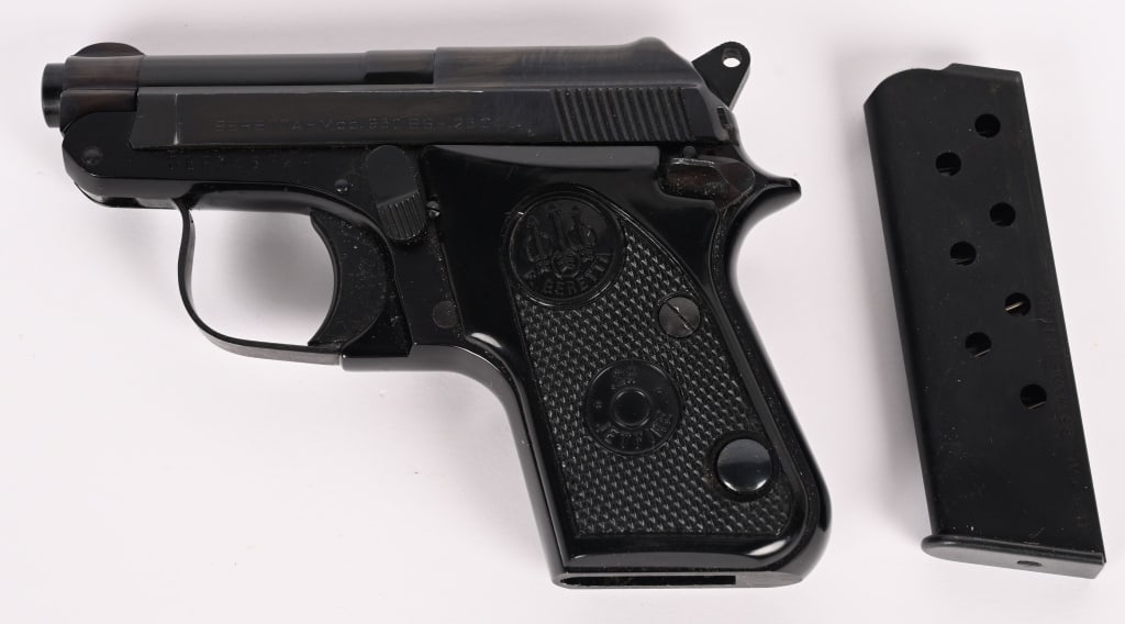 BERETTA MODEL 950-BS .25 POCKET AUTO: SERIAL NUMBER: BER35672V. BARREL: 2 3/8". CALIBER: 25 AUTO. MANUFACTURED: 1980. Metal is blued steel with black alloy frame and ONE magazine. Black plastic grips. (1) 8 round magazine. CONDITION:
