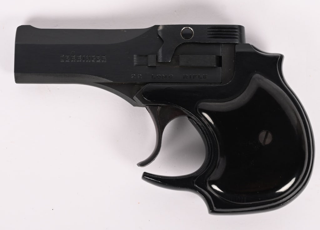 HIGH STANDARD DERRINGER .22LR: SERIAL NUMBER: D78356. BARREL 3.5". CALIBER .22 LONG RIFLE . High quality over under .22 derringer with blue finish, cut out trigger guard, black plastic grips. CONDITION: Very Good. 98%. Operates