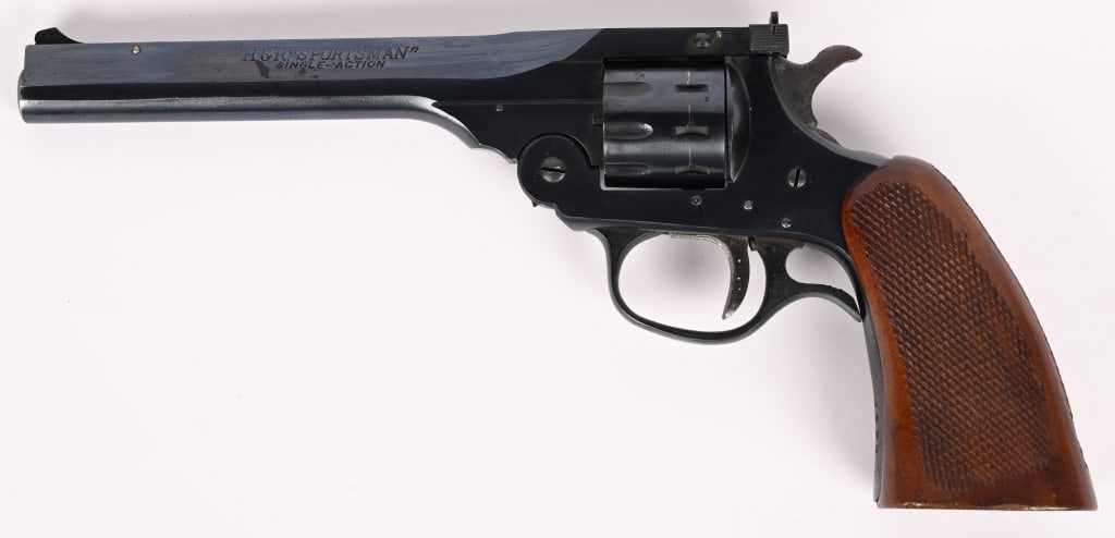 H&R SPORTSMAN DOUBLE ACTION REVOLVER 22 LR: SERIAL NUMBER: J490. BARREL: 6". CALIBER: 22 LR. MANUFACTURED: 1950 - 1960 Made in USA. Harrington & Richardson H&R Top Break "SPORTSMAN." Features blued finish, adjustable rear sight, and checkered