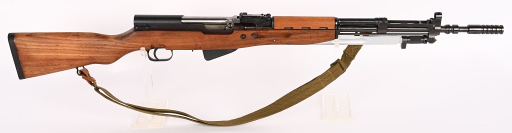 YUGOSLAVIAN M59/66 SKS SEMI AUTOMATIC RIFLE: SERIAL NUMBER: U-684240. BARREL: 24". CALIBER: 7.62X39. CAI import marked on the barrel. Post front sight and rear tangent. Standard flip up night and grenade sight as well. Folding bayonet. Original