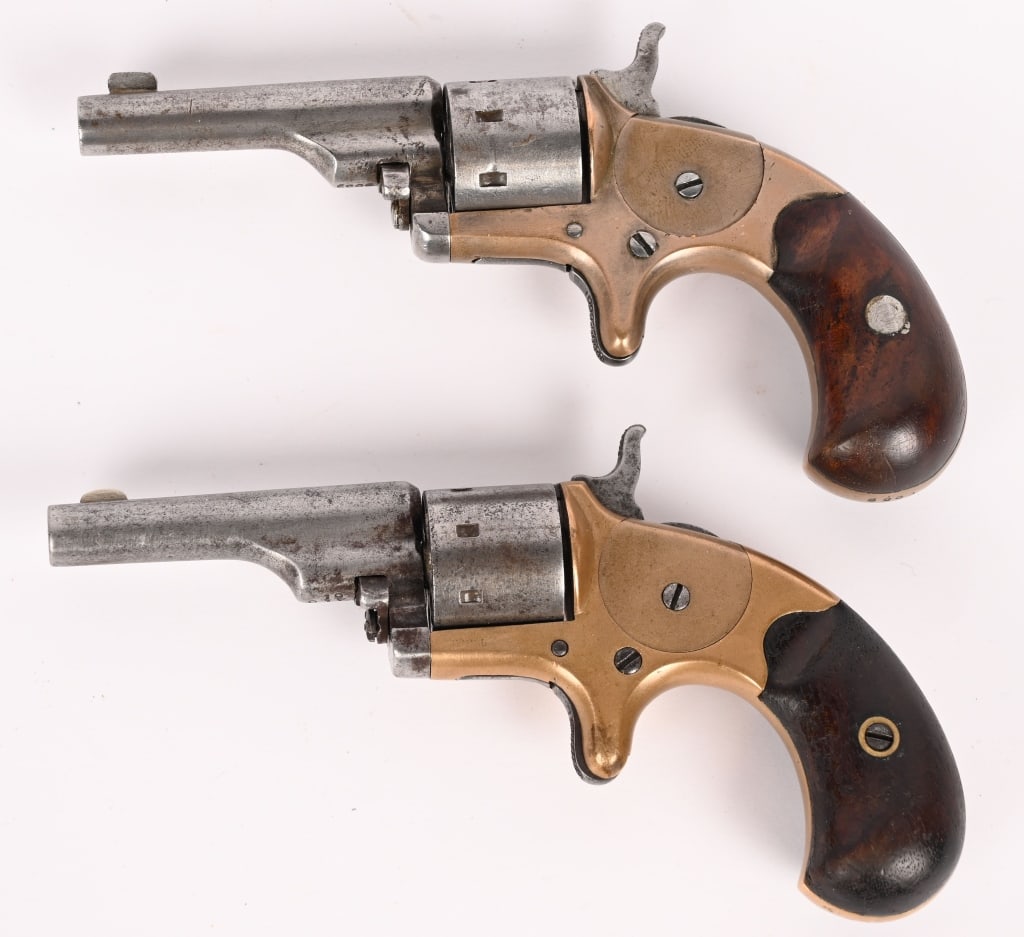 PAIR OF COLT OPEN TOP 7 SHOT .22 POCKET REVOLVERS (1 of 9)