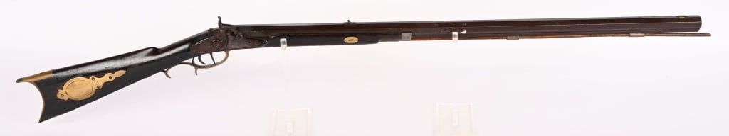CHARLES KING SIGNED HALF STOCK PERCUSSION RIFLE: SERIAL NUMBER: NSN BARREL: 34 1/2. CALIBER: about .45. Full tiger maple stock with octagon barrel marked "N H" on top flat. The N is backward and there is an etched geometric design around the rear