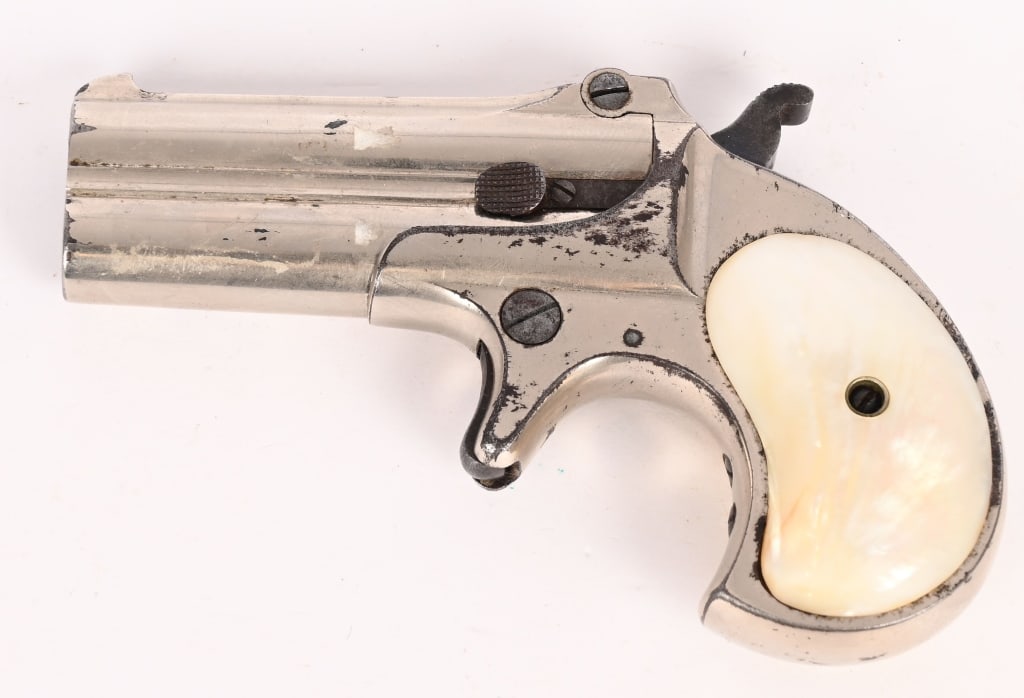 REMINGTON MODEL 95 NICKELED DERRINGER 41 RF: SERIAL NUMBER: 182 BARREL: 3" CALIBER: 41 RF. MANUFACTURED: 1866 - 1867. It is an over under top hinge derringer with nickel finish. Mother of pearl grips are present. CONDITION: Metal has 75% finish