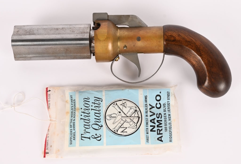 CMC REPRODUCTION 4 SHOT PEPPER BOX 36 CAL.: SERIAL NUMBER: 05936 BARREL: 3 1/2" CALIBER: 36 BLACK POWDER. Four shot .36 cal, percussion Pepperbox with brass frame and varnished walnut stock. This is a kit gun and apears to be unfired. BLACK POW