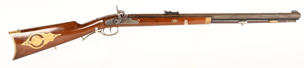 ARMSPORT INC. MUZZLE LOADER 50 CALIBER: SERIAL NUMBER: 36234 BARREL: 29" CALIBER: 50 BP MANUACTURED: 1990 - 2000 Made in Italy. Metal is blue finish steel with rifle sights. Case color hammer and lock. Brass trigger guard, patch box and