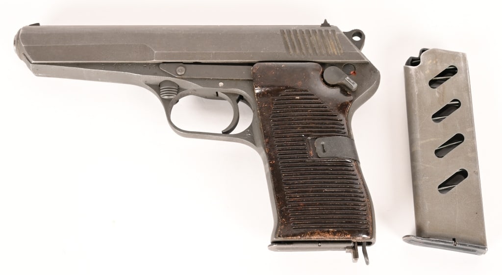 CZECH MODEL CZ 52 PISTOL CAL 7.62X25 WITH XTRA MAG: SERIAL NUMBER S12538 BARREL 4-3/4" CALIBER 7.62X25 MANUFACTURED 1950's. Produced at Brno with unique roller locking lug system derived from the MG42 Machine gun. Parkerized finish with brown bakelite 
