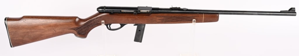 SQUIRES BINGHAM MODEL 20 SEMI AUTOMATIC RIFLE: SERIAL NUMBER: 23-971463. BARREL: 20 7/8'. CALIBER: .22 LR. Imported by KMART USA, this rifle features blued barrel with integral case deflector, checkered wood stock front hooded sight and