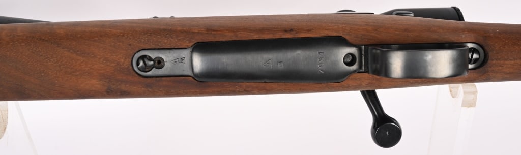 YUGOSLAVIAN M48 MAUSER BOLT ACTION RIFLE 8MM: SERIAL NUMBER: K7891. BARREL: 23 1/4". CALIBER: 8MM. This is a sporterized M48 with a fine Mauser action. It features a blued stepped barrel, Monti Carlo style hardwood stock, hooded front sight,