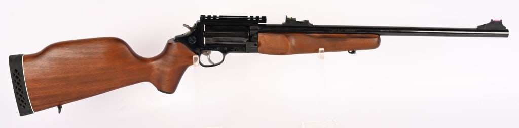TAURUS ROSSI CIRCUIT JUDGE CARBINE IN .45LC/.410: SERIAL NUMBER: ER7073. BARREL: 18-1/2". CALIBER: .45 LC/.410 GAUGE. Made in Brazil by Braztech. Five shot fluted cylinder. Fiber optic front sight and u-notch rear. Original blued finish, case color
