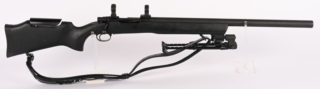 ULTRA HEAVY BARREL MAUSER 7.62X51 RIFLE: SERIAL NUMBER 200396. BARREL: 24 1/2". CALIBER: 7.62X51. This rifle is a major league tack driver. Weighing in at 18.6 pounds, this rifle features a ultra heavy barrel with synthetic sock, heavy duty
