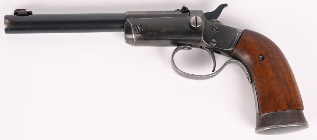 J STEVENS OFF-HAND NO 35 TIP UP SINGLE SHOT PISTOL: SERIAL NUMBER: 36103. BARREL: 6". CALIBER: .22 LR. MANUFACTURED: circa 1910s. This pistol features a tip up loading design, single shot blued barrel, blued frame, trigger guard, trigger and hammer,