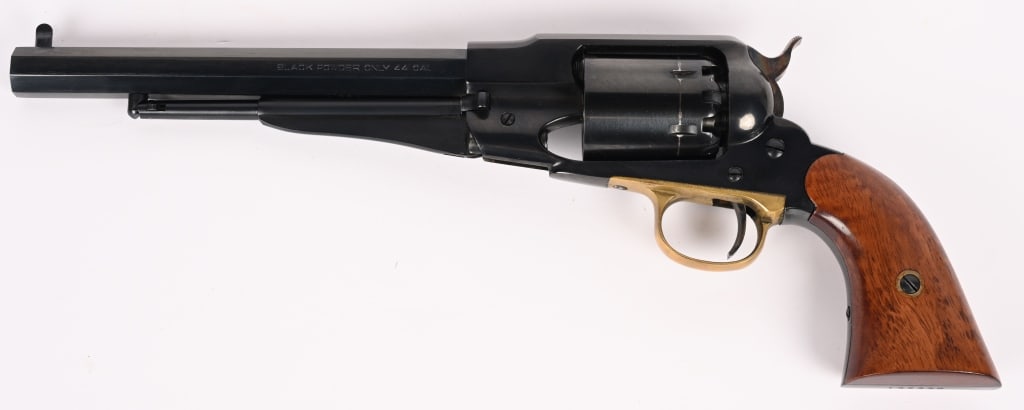 PIETTA 1858 REMINGTON .44 CAL REVOLVER: SERIAL NUMBER: 192336. BARREL: 8 1/8". CALIBER: .44. This 1858 features a blued finish, case color trigger and hammer, brass trigger guard and walnut grips. CONDITION: Very Good. The bore is bright