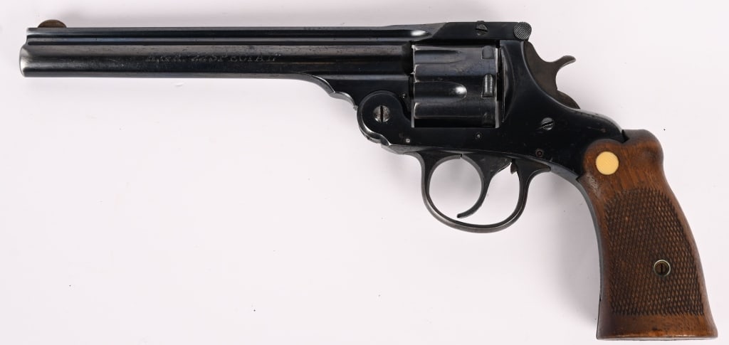 PRE WAR H&R "22 SPECIAL" TOP BREAK TARGET REVOLVER: SERIAL NUMBER: 500810. BARREL: 6'. CALIBER: .22 LR. MANUFACTURED: PRE-1940. The H&R (Harrington & Richardson) .22 Special is a vintage top-break revolver, commonly produced in the early-to-mid 20th