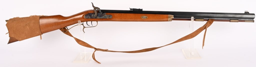 CONNECTICUT VALLEY ARMS HAWKEN 50 CAL: SERIAL NUMBER: 523516. BARREL: 28". CALIBER: .50. Metal is blued steel barrel with notch rear and blade front. Lock plate has faint case color and stainless steel nipple. Stock is walnut with brass