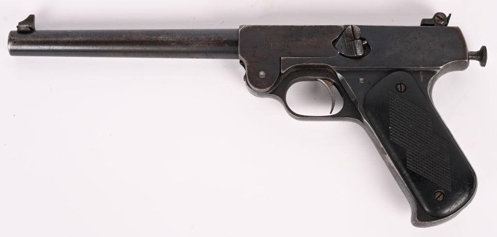 RARE J. STEVENS MODEL 10 SINGLE SHOT .22 PISTOL: SERIAL NUMBER: . BARREL 7.5". CALIBER 22 LR MADE FROM 1917-1920. Scarce heavy single shot target pistol features a blue finish, black checkered grips, target rear sight, tip-up design. CONDITION: Very