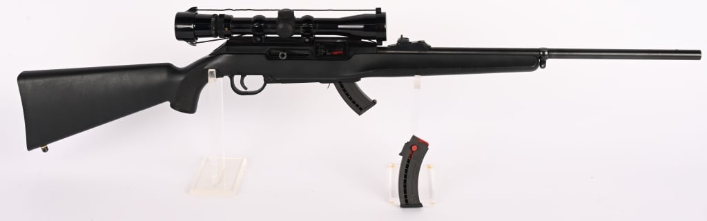 REMINGTON MODEL 522 VIPER .22 SEMI RIFLE: SERIAL NUMBER: 3009471. BARREL: 20". CALIBER: .22 LR. MANUFACTURED: 1993 - 1998. Metal is blued finish. Stock is black plastic. This rifle comes with an aftermarket barrel mounted sling stud, (2) 10