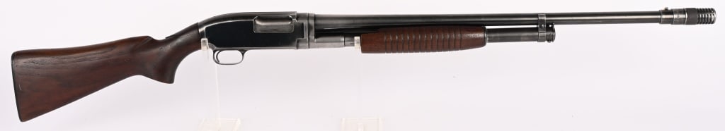 WINCHESTER MODEL 12 GAUGE SLIDE ACTION SHOTGUN: SERIAL NUMBER: 1691257. BARREL: 27 1/2" (W/COMP). GAUGE: 12 GA. CHOKE: MOD. CHAMBER: 2 3/4". LOP: 14. DAC: 1 1/2". DAH: 2 1/4". MANUFACTURED: 1957. The Winchester Model 12 is a renowned, hammerless, p