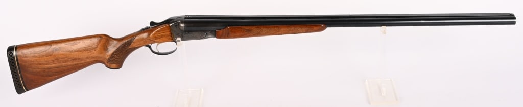 SAVAGE ARMS FOX MODEL B SIDE BY SIDE SHOTGUN: SERIAL NUMBER: 19L. BARRELS: 30". GAUGE: 12 GA. CHOKE: IMOD (LEFT), MOD (RIGHT). CHAMBER: 2 3/4". LOP: 13 3/4". DAC: 1 1/2". DAH: 2 3/4". This shotgun features blued, grooved ribbed barrel, engraved