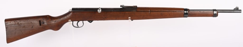 HAENEL SPORT MODEL 33 4MM AIR RIFLE: SERIAL NUMBER: 20783. BARREL: 19". CALIBER: 4MM. MANUFACTURED: 1933-1942. Used by Hitler Youth as training Rifle- same size as K98 but a lot lighter. The model 33 is a magazine fed bolt action spring