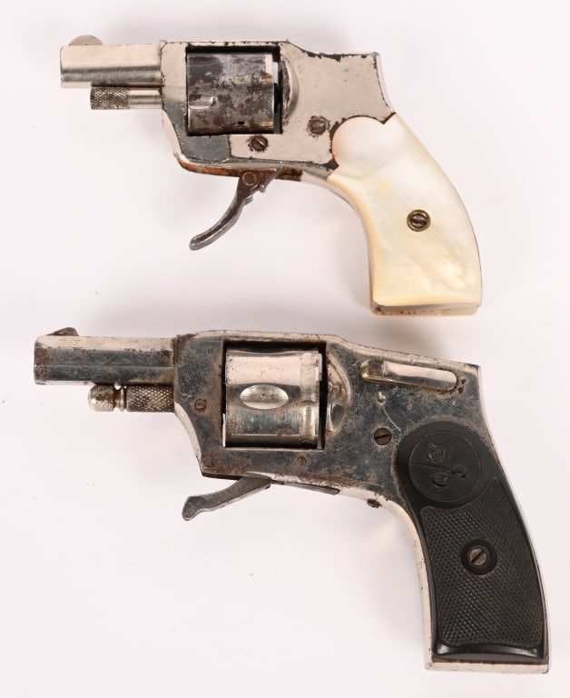 A PAIR OF HAMMERLESS REVOLVERS (1 of 7)