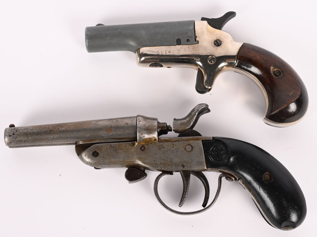 A PAIR OF 22 CAL POCKET PISTOLS (1 of 10)