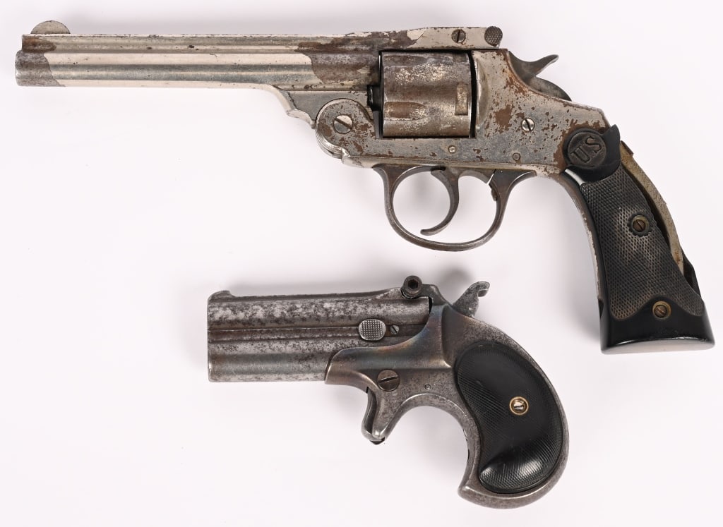 TWO GUNSMITH SPECIAL VINTAGE PISTOLS (1 of 7)