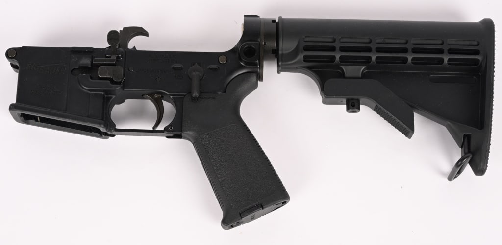 SIG SAUER SIG516 LOWER AR15 COMPLETE RECEIVER: SERIAL NUMBER: 20G008908. CALIBER: 5.56 NATO. This is a Sig Sauer SIG516 complete lower receiver assembly. It has all the appropriate AR15 features that you would expect. It also features a ambidextro