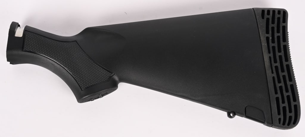 MOSSBERG SYNTHETIC STOCK: This is a Mossberg synthetic stock with waffle rubber recoil pad.