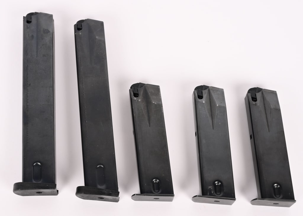 LOT OF 5 RUGER P85 MAGAZINES: This lot contains (3) 15 round and (2) 20 round magazines