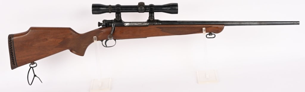 SPORTERIZED SPRINGFIELD ARMORY 1903 RIFLE 30-06: SERIAL NUMBER: 852945. BARREL: 20". CALIBER: 30-06 SPRINGFIELD. This 1903 is fitted with a fine checkered hardwood stock with sling eyes and a waffle rubber recoil pad. It also sports a Weaver k4-c3