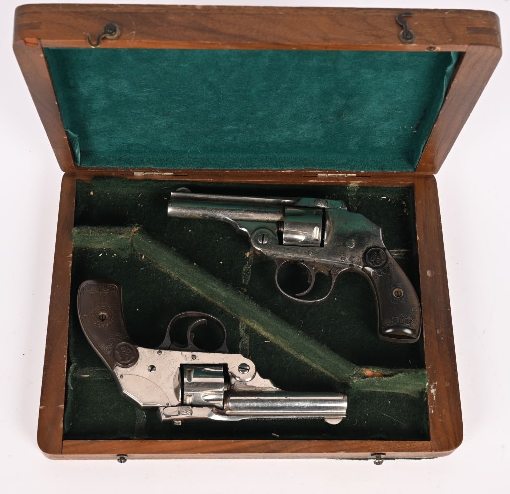 LOT OF 2 IVER JOHNSON & CYCLE WORKS TOP BREAK: SERIAL NUMBERS: 49 AND 39423 BARREL: 3 " CALIBER: 32 S&W MANUFACTURED: 1900s Nickel finish with blade front sights and notch rears. Grips are hard rubber with owl's head showing. Comes in a wooden