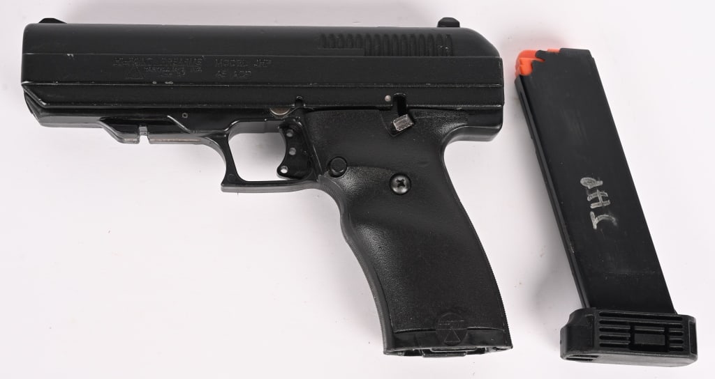 HI-POINT MODEL JHP SEMI AUTO PISTOL .45 ACP: SERIAL NUMBER: 4129947. BARREL: 4 1/2". CALIBER: .45 ACP. The Hi-Point JHP is a polymer-framed semi automatic striker fired blow back pistol. It features a 9 round detachable magazine, 3-dot adjustabl