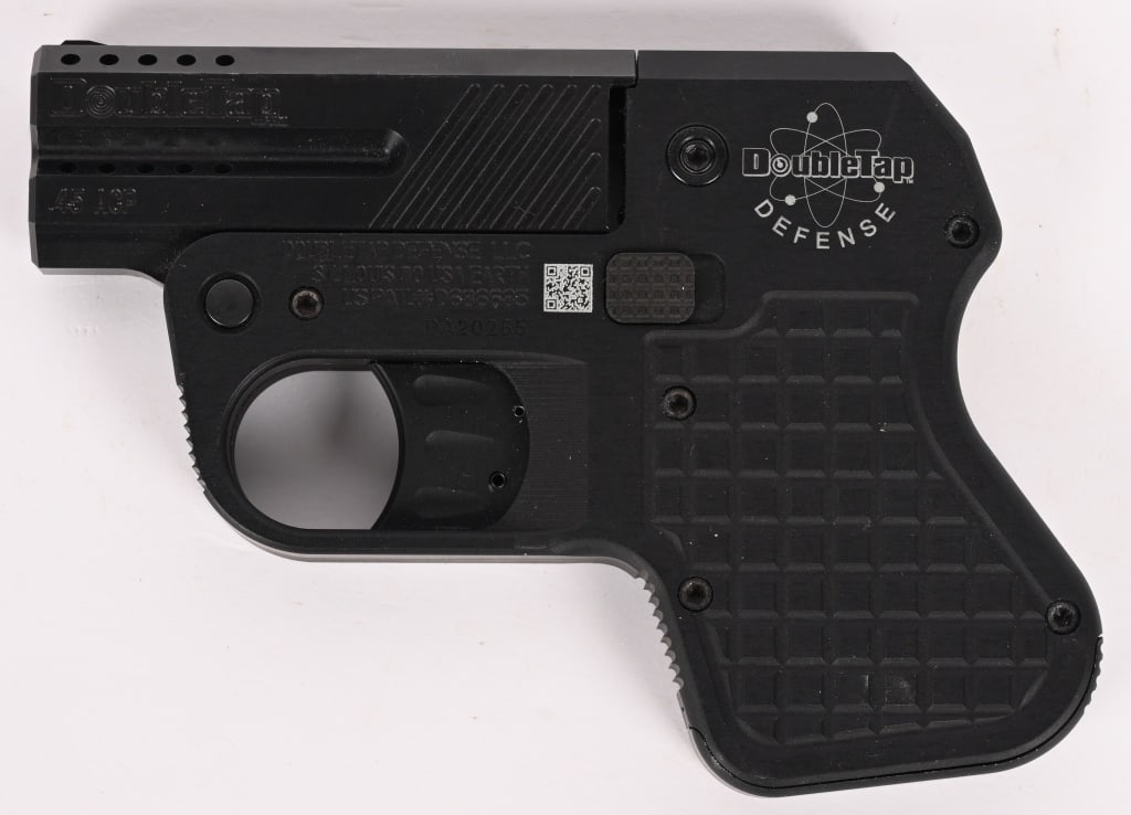 DOUBLE TAP OVER UNDER .45 DERINGER (1 of 4)