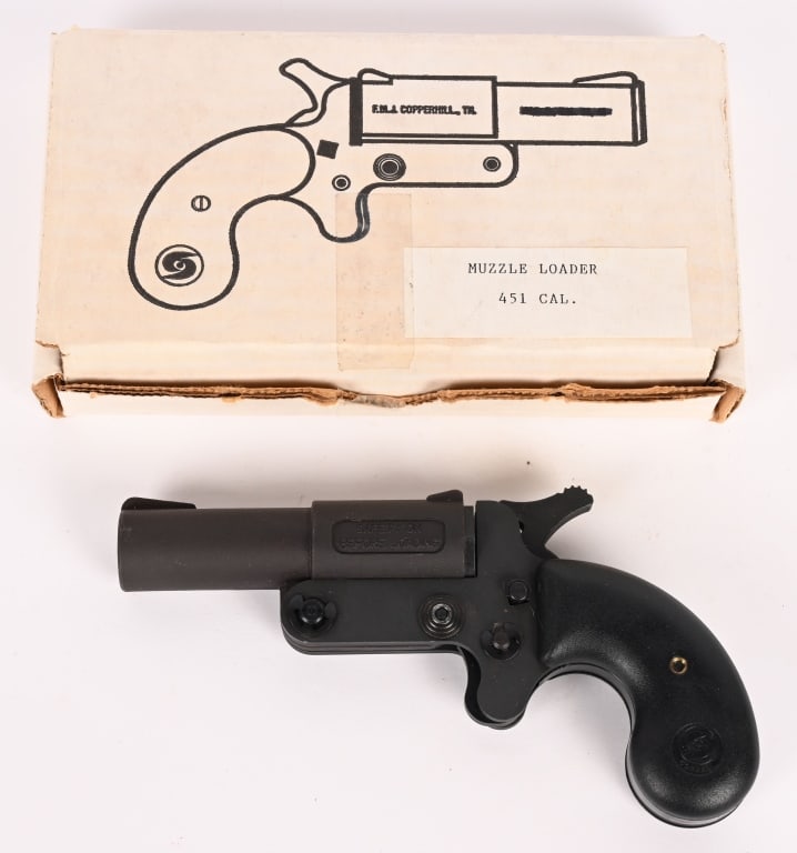 COBRAY FMJ BLACK POWDER TIP UP PISTOL: SERIAL NUMBER: NSN. BARREL: 3 3/8". CALIBER: .451. This is a black powder single shot tip up pistol. It features a black matte finish with polymer grip panels. Factory box. CONDITION: Very Good.
