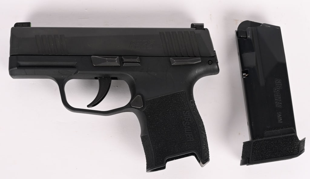 SIG SAUER P365 SEMI AUTO PISTOL 9MM: SERIAL NUMBER: 66B125487. BARREL: 3". CALIBER: 9X19. Standard markings and features. Factory H3 tritium night sights. Matte blued slide and black polymer frame. Includes factory 12 round metal magazin