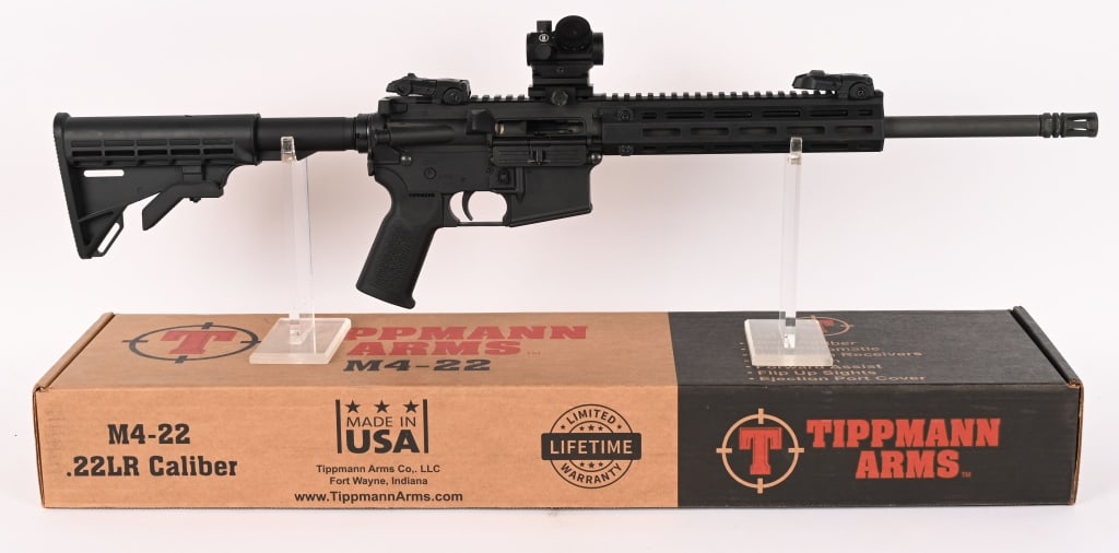 TIPPMANN ARMS M4-22 SEMI AUTO RIFLE W/ RED DOT: SERIAL NUMBER: 054031. BARREL: 16". CALIBER: .22LR. The Tippmann M4-22 is a premium, semi-automatic .22 LR rimfire rifle that precisely mirrors the ergonomics, controls, and feel of a standard mil-spe