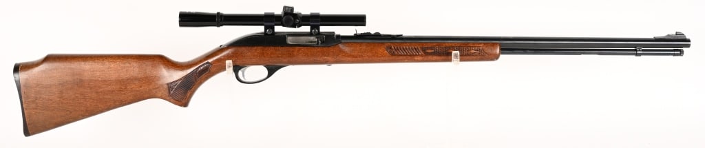 MARLIN MODEL 60 SEMI AUTO RIFLE W/ SCOPE: SERIAL NUMBER: 24356841. BARREL: 22". CALIBER: 22 LR. MANUFACTURED: 1976. Metal is blue finish with coated receiver. Wood is hardwood with pressed wild life scene and plastic butt plate. It sports a