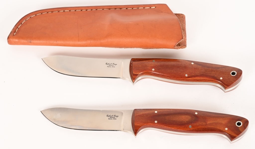 A PAIR OF ROBERT PAPP SKINNER KNIVES: BLADE: 3 7/8". OAL: 8 3/4". BLADE STOCK: 0.20. BLADE DEPTH: 0.94". These are two very fine skinning knives from Robert Papp. The left side of the blade is marked "Robert Papp Maker Elyria Ohio". Taper