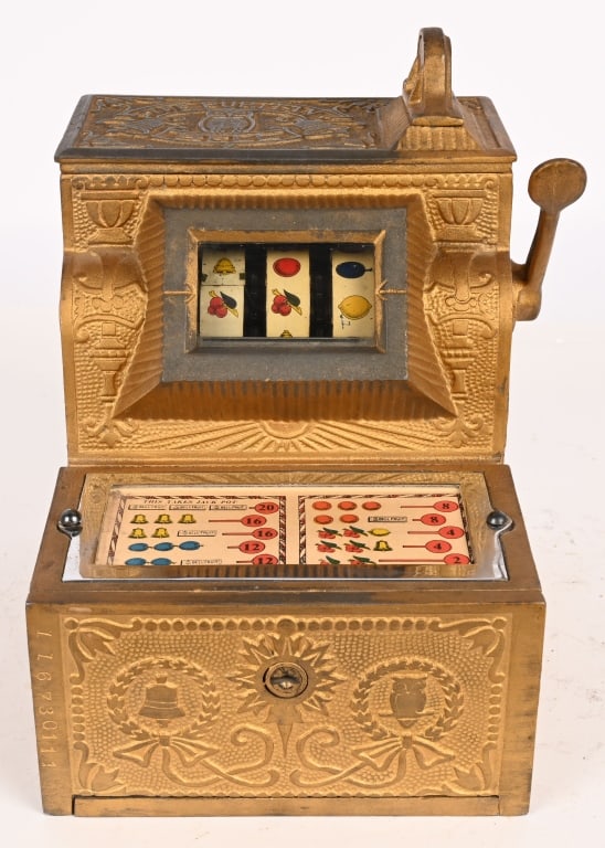 5c MILLS PURITAN BELL TRADE STIMULATOR: Very nice 5c Mills Puritan Bell trade Stimulator. Case has very ornate casting. Worked well when tested. Very nice piece. 11 3/4"x10 1/2" Excellent Provenance: Rick Frink Collection